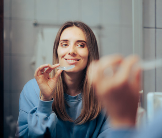 Patient in Fort Worth smiling with Invisalign