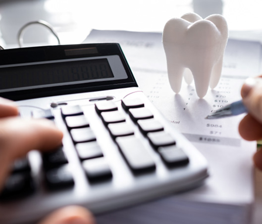 Patient in Fort Worth budgeting for Invisalign